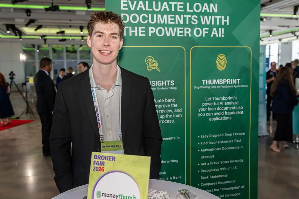 Alex at Broker Fair 2026 in Front of MoneyThumb Booth