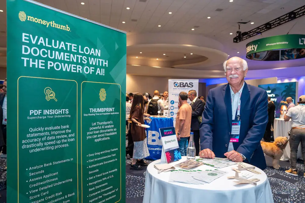 DeBanked Miami 2026 with Don in front of MoneyThumb booth