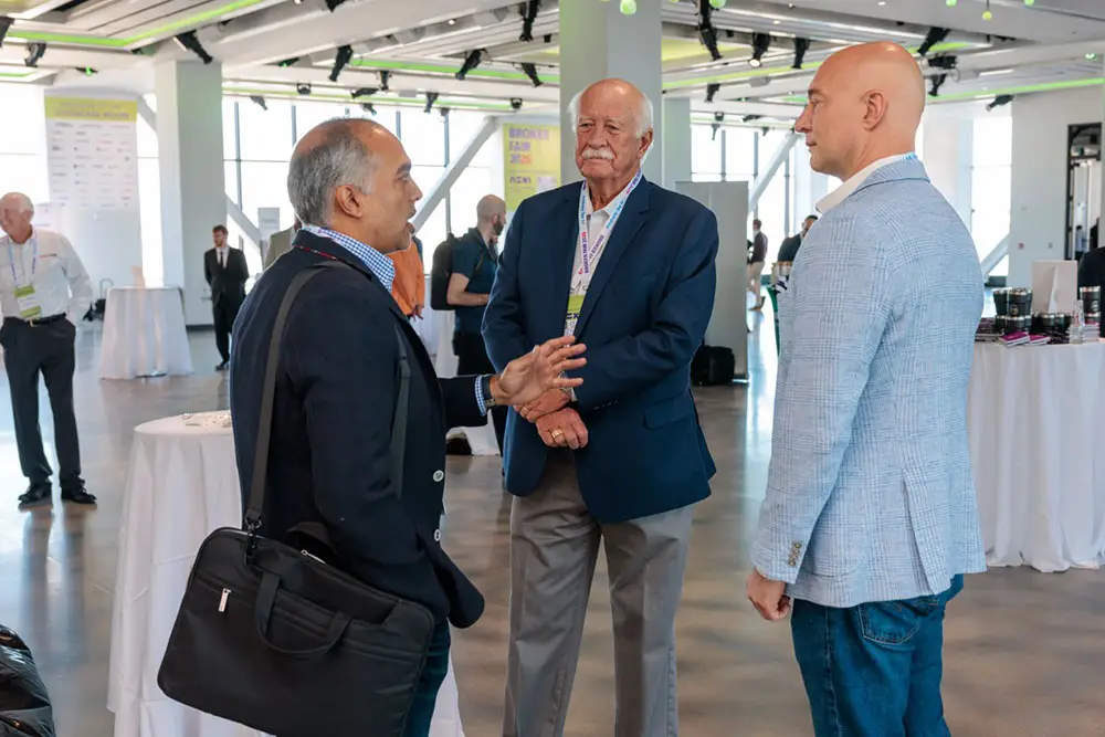 Don and Ryan at Broker Fair 2026 Talking to Guest